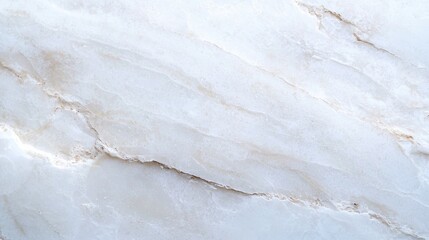 A smooth, light-colored stone surface with subtle veins, ideal for countertops or decorative elements.