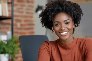 Fototapeta premium Smiling Woman with Curly Hair in Home Office