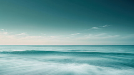 Obraz premium A serene ocean view at dusk, showcasing calm waters and a tranquil sky, creating a peaceful atmosphere.