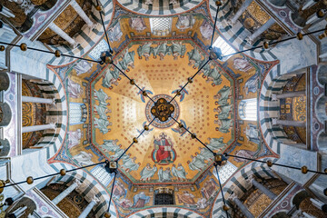 A detailed view of the painted ceiling in Aachen Cathedral