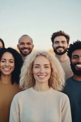 Obraz premium diverse group of individuals from different cultural backgrounds standing together with smiles showing