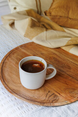 Relaxing with a morning tea in bed