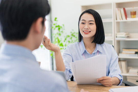 Successful job interview in a modern office setting between a hiring manager and an applicant