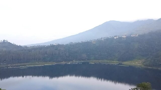 Wonosobo, Indonesia - 11 February 2025: Telaga Menjer is a lake located in Maron, Garung, Wonosobo. This lake is used as a natural tourist attraction and provides water for hydroelectric power plants 