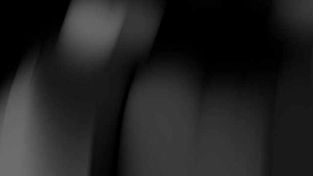 Black background with a dark gray blurry light source