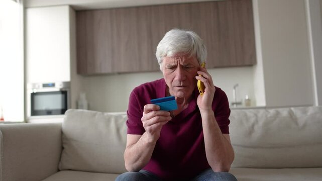 Naive elderly pensioner trusting sharing card number with scammers on phone. Identity theft, card fraud, manipulation, financial deception, personal data exposure, phone scam, dishonest schemes