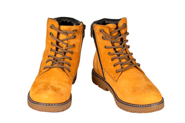 Winter brown nubuck boots with laces and zipper on a white background