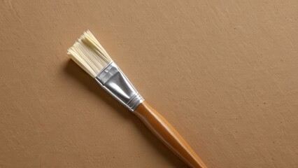  A smooth paintbrush rests elegantly on a rich