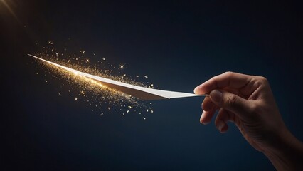 Fototapeta premium A hand releases a paper airplane with a trail of sparkling light following it symbolizing dreams aspirations and the pursuit of goals.