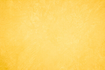 Yellow concrete stone texture for background in summer wallpaper. Cement and sand wall of tone vintage minimal. Concrete abstract wall of light yellow color, cement texture white blank for home decor.