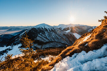 Winter hiking to Velky Rozsutec in Mala Fatra National park is full of beautiful views. Sunset in Slovakia mountains. Slovakia landscape