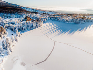 Frozen winter mountain lake Strbske pleso. Strbske lake with view of the High Tatras National Park,...