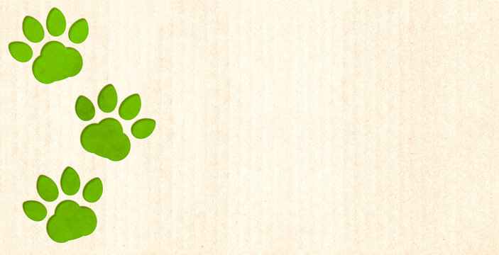 Eco paper texture and animal paws print in paper cut style. Sustainable development of strategy approach to zero waste, responsible consumption. Reuse, renewable resource, eco-friendly concept