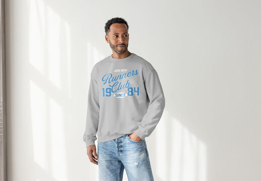 Stylish Black Man in Casual Sweater Looks Away Thoughtfully. PSD template mockup