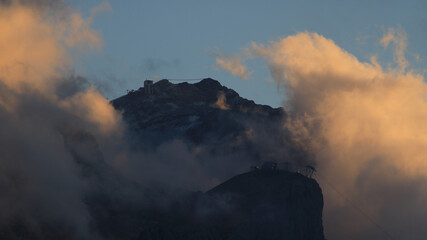 Glacier 3000 summit station and suspension bridge at sunset, Switzerland.