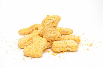 Pile of beef nuggets isolated on white background.Copy space for text.Fast food industry concept.Beef nuggets.For graphic design,3D rendering or banner background