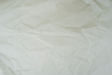 Naklejka premium Bright White Crumpled Recycled Paper Texture with Wrinkles and Folds