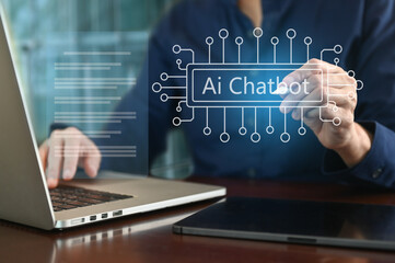 A businessman interacts with an AI Chatbot interface