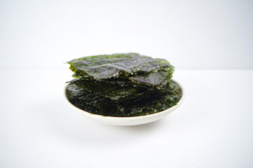 nori placed on a white cup isolated on a white background