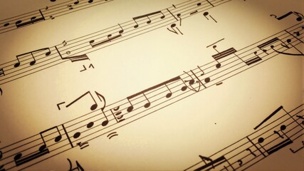 Obraz premium A musical score with notes and a heart