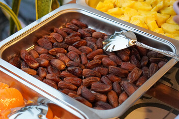 Fresh dates, captured on March 12, 2025. Naturally sweet and chewy, perfect for a nutritious snack or a traditional Ramadan treat