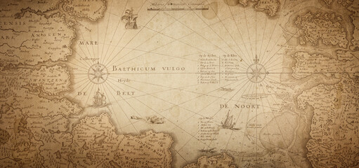 Old map collage background. A concept on the topic of sea voyages, discoveries, pirates, sailors,...