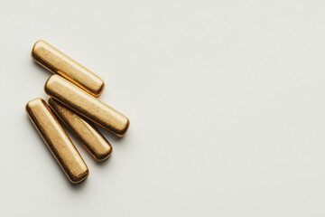 Gold bullion bars on minimalist white background, elegantly arranged