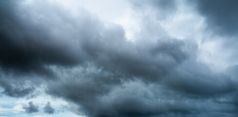 Storm cloud sky dark black background, cloudy rain heaven thunderstorm dramatic grey day.