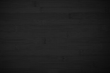 Grunge dark wood plank texture background. Vintage black wooden board wall antique cracking old style background objects for furniture design. Painted weathered peeling table wood hardwood decoration.