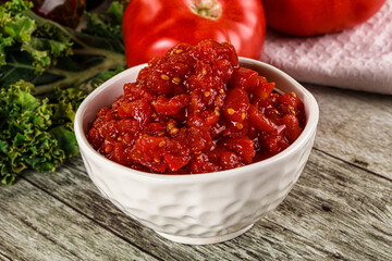 Diced ripe tomato with sauce