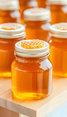 Honey Jars Displayed on Wooden Table