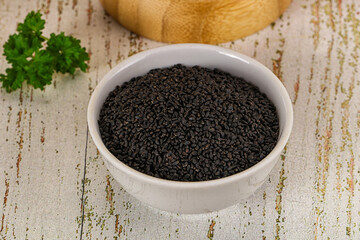 Black dry Nigella seeds in the bowl
