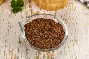 Brown flax seeds in the bowl