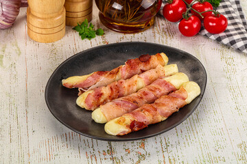 Hot mozzarella sticks with bacon