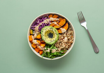 Healthy Vegan Buddha Bowl with Avocado, Quinoa, and Roasted Vegetables