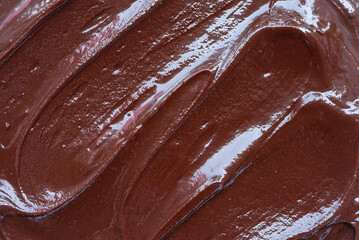 Smear of tasty chocolate paste.Sweet melted chocolate, top view