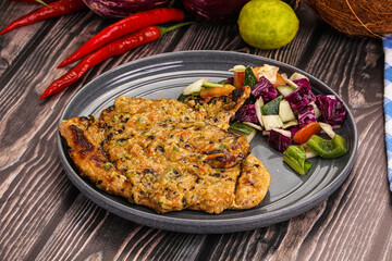 Tasty chicken steak with vegetables