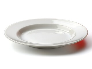 Empty plate resting on a clean white surface