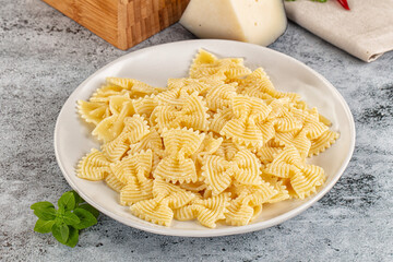 Italian pasta Farfalle with oil
