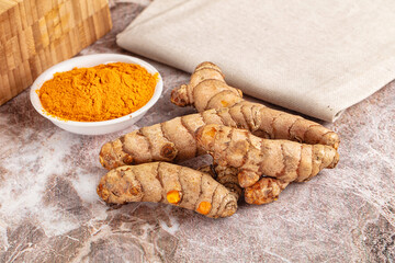 Fresh aroma tumeric roots heap