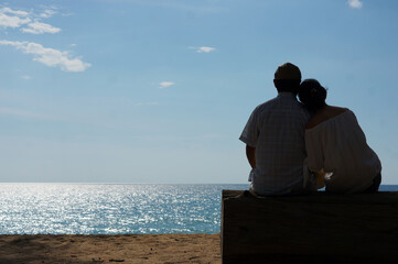 Romantic Silhouette of a Couple by the Beach