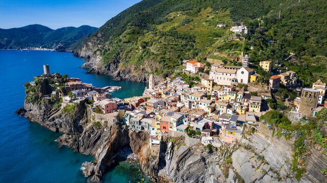 Italy, Cinque terre  national park in Liguria.  traditional fishing village  Vernazza. Aerial view with  colorful houses and picturesque bay. popular tourist attraction
