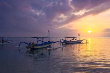 Sanur beach is a coastal stretch of beach east of Denpasar in southeast Bali, and a lot of traditional fishing boats(spider boat), is one of the famous tourist beaches on the island of Bali 