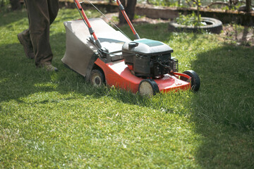 Lawn mover on green grass. Machine for cutting lawns.