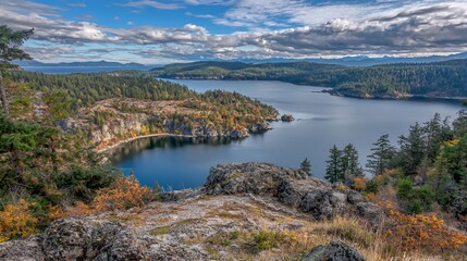 Naklejka premium Autumnal Coastal Landscape with Blue Bay and Green Hills