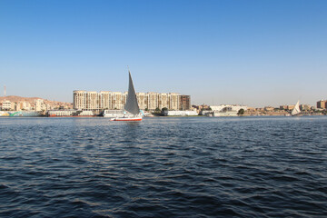 Felucca sailing on Nile River in a sunny afternoon at Aswan, Egypt
