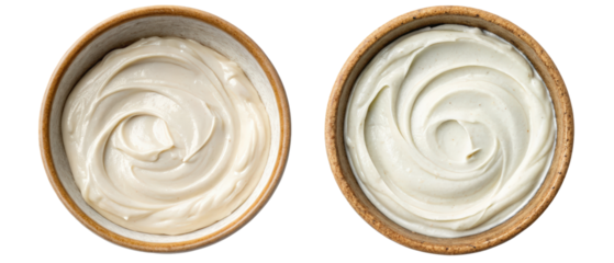Two bowls of creamy white sauce isolated with transparent background