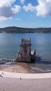 DRONE AERIAL FOOTAGE: The Belem Tower (Torre de Bel&eacute;m) was built between 1514 and 1520 in a Manueline style by the Portuguese architect and sculptor Francisco de Arruda.