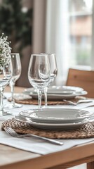 Elegant Table Setting: A beautifully arranged dining table, featuring crystal stemware, pristine plates, and a delicate floral arrangement. perfect for a cozy gathering or a special occasion.