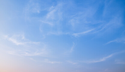 Fototapeta premium the sky is clear blue with fluffy white clouds, the sky is very bright, and the sun shines.